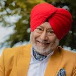 Jaswinder Bhalla smiling on film set, iconic Punjabi comedian and actor