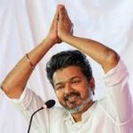 Tamil actor Vijay helps fan hanging dangerously during Madurai public meeting