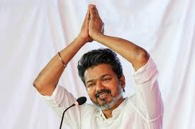 Tamil actor Vijay helps fan hanging dangerously during Madurai public meeting